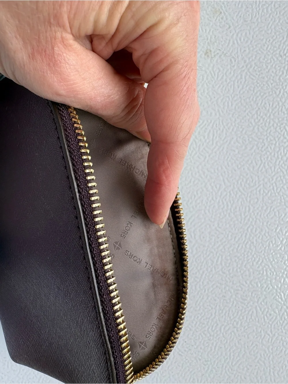 Michael Kors Plum Perforated Leather Cosmetic Pouch